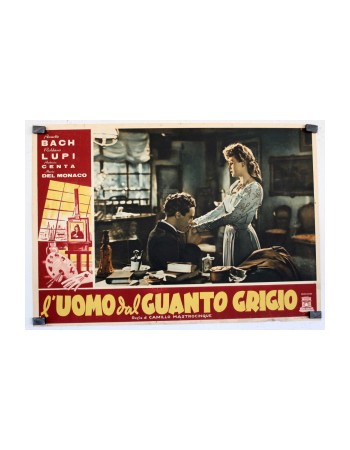 LUOMO DAL GUANTO GRIGIO